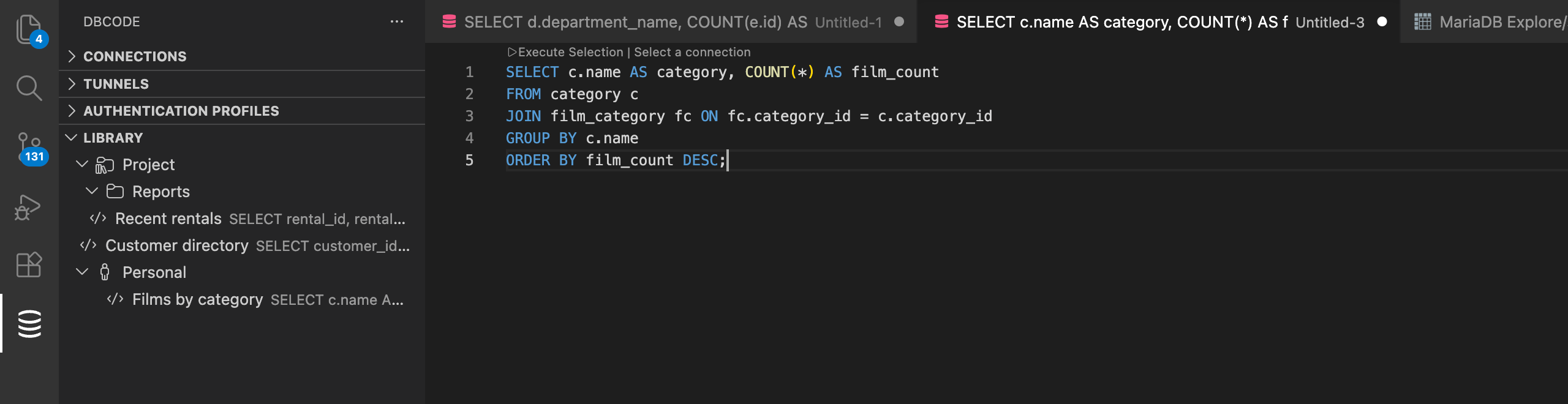 Library panel with Project and Personal scopes, an expanded Reports folder, and saved SQL scripts